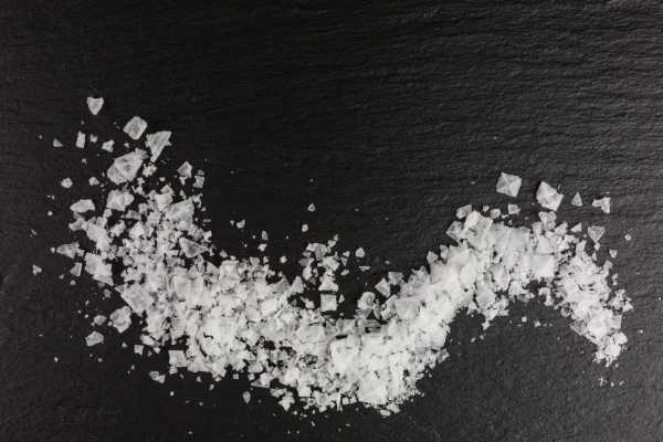 salt crystals on a black table